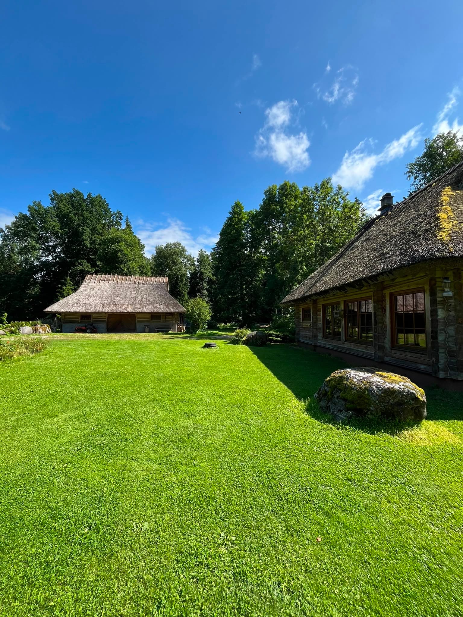The old granary and sauna at the lawn’s edge
