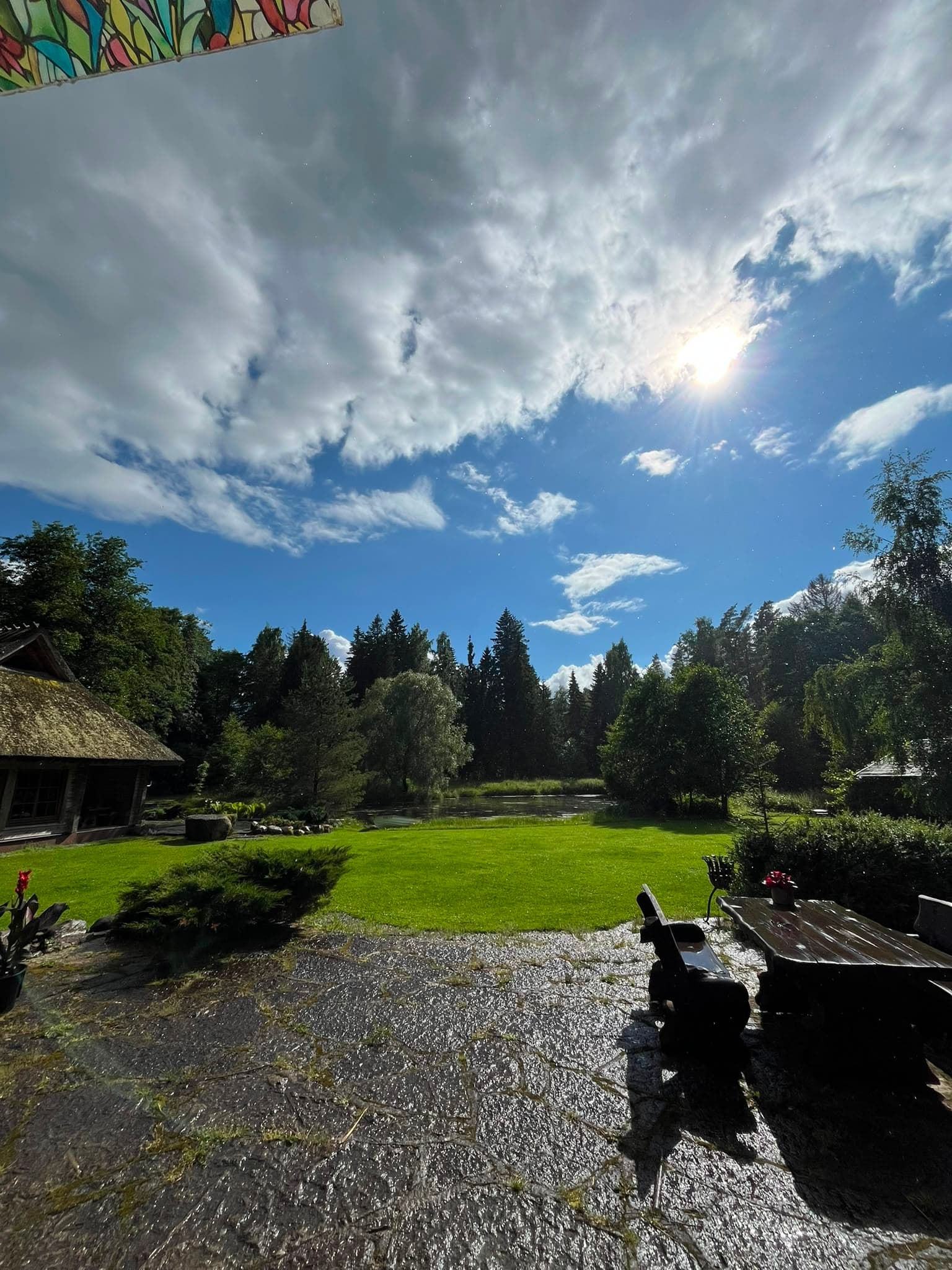 The outdoor seating area under a wide blue sky